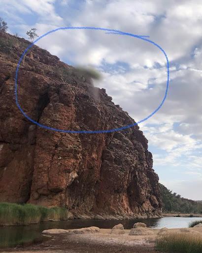 Unexplained caterpillar-like blur photographed at Glen Helen Gorge