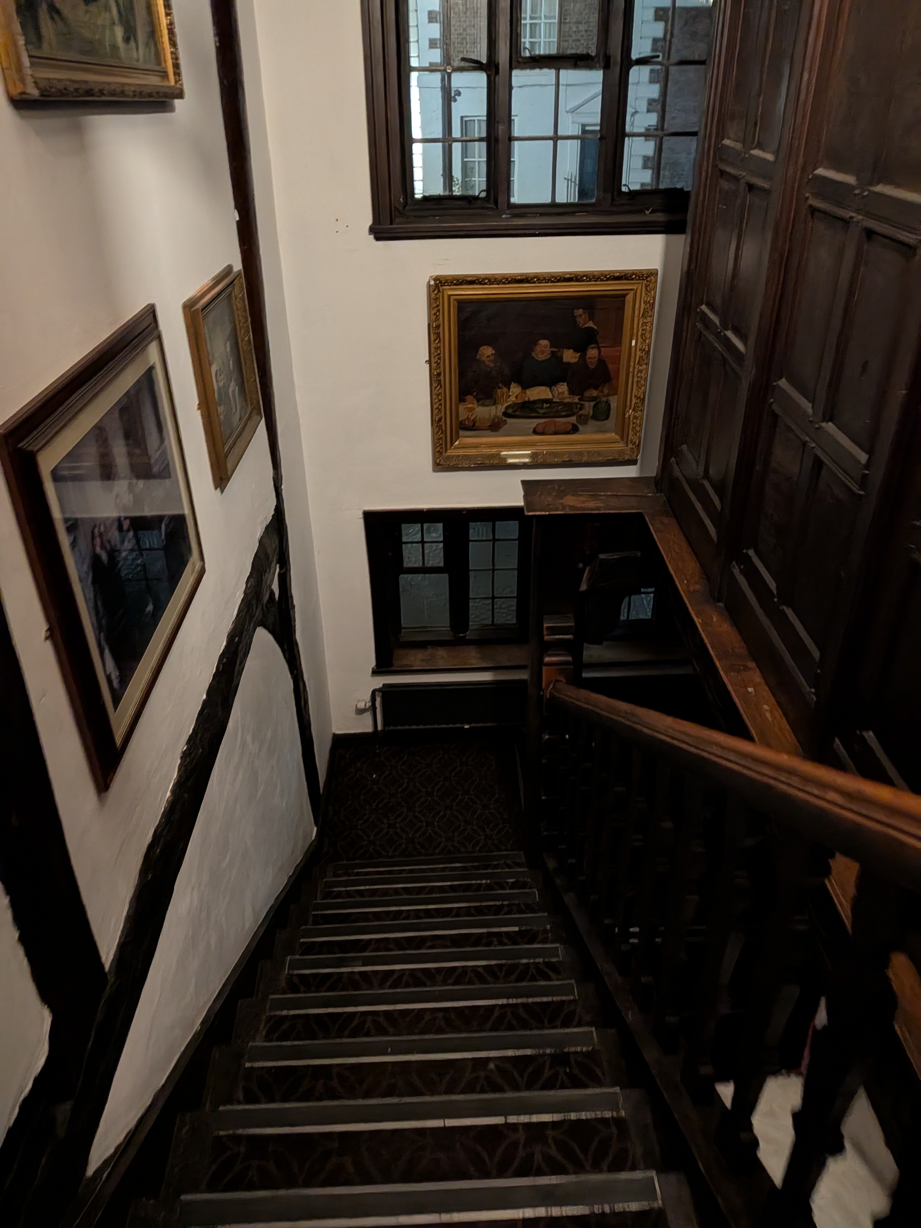 Historic staircase inside Ye Olde Kings Head